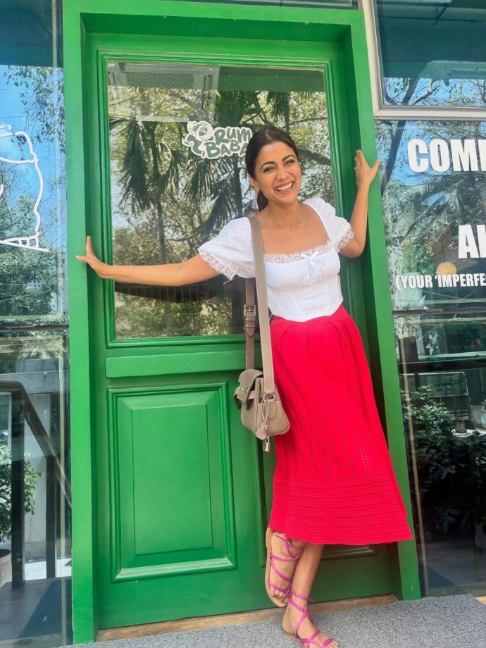 Shriya Saran Stuns in Red Skirt and White Top with Effortless Summer Style 996197
