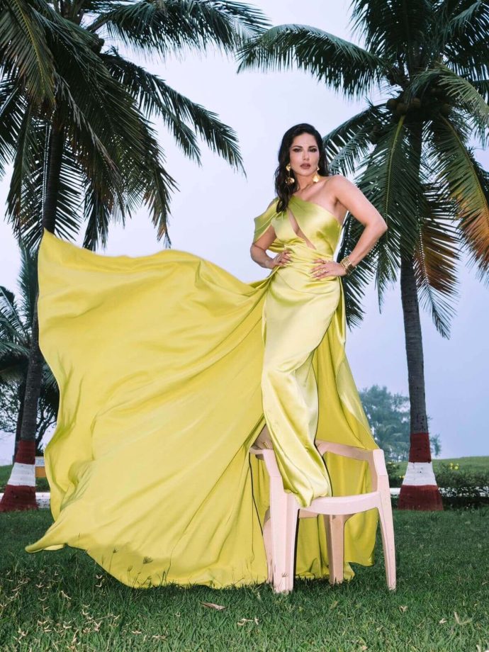Sunny Leone turns heads in a flowing lime gown with bold beachside glam 996665