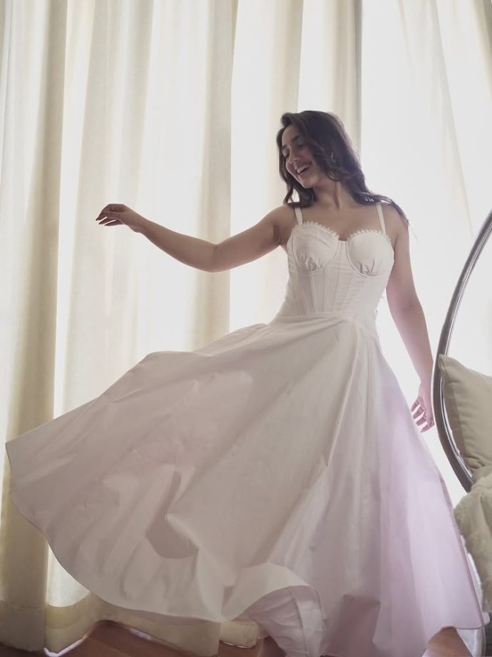 Ashnoor Kaur Glows in Dreamy White Corset Dress 1000112