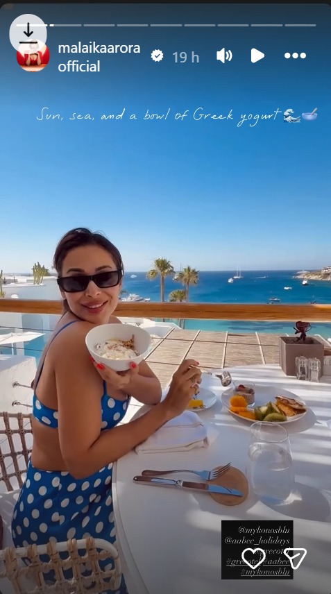 Malaika Arora Enjoys Scenic Greece Getaway with healthy breakfast in a Blue Polka Dot Co-ord Set 1001153
