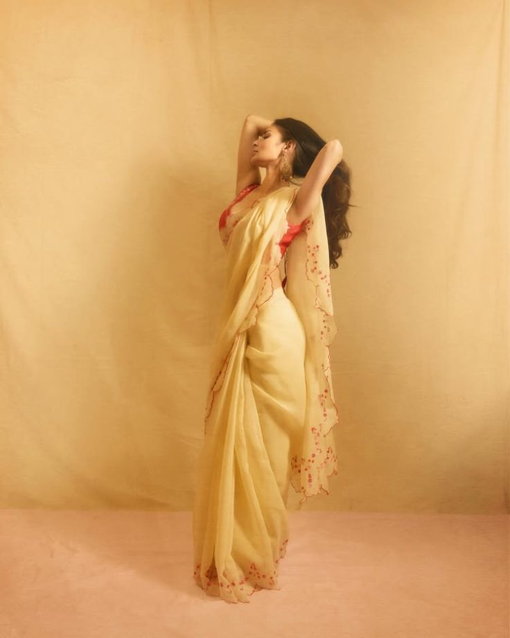 Mouni Roy Elevates Ethnic Glam in a Backless Blouse with a Butter Yellow Cotton Saree 1000689