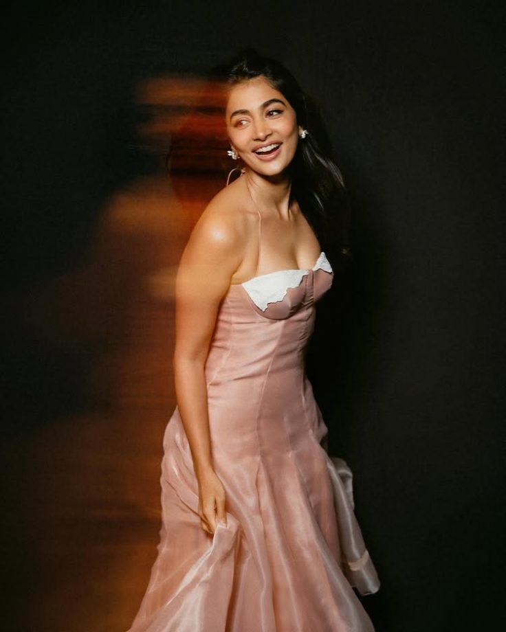 Pooja Hegde Floats Through Pink Elegance in a Dreamy Corset Dress 1000046