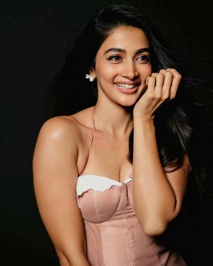 Pooja Hegde Floats Through Pink Elegance in a Dreamy Corset Dress 1000047