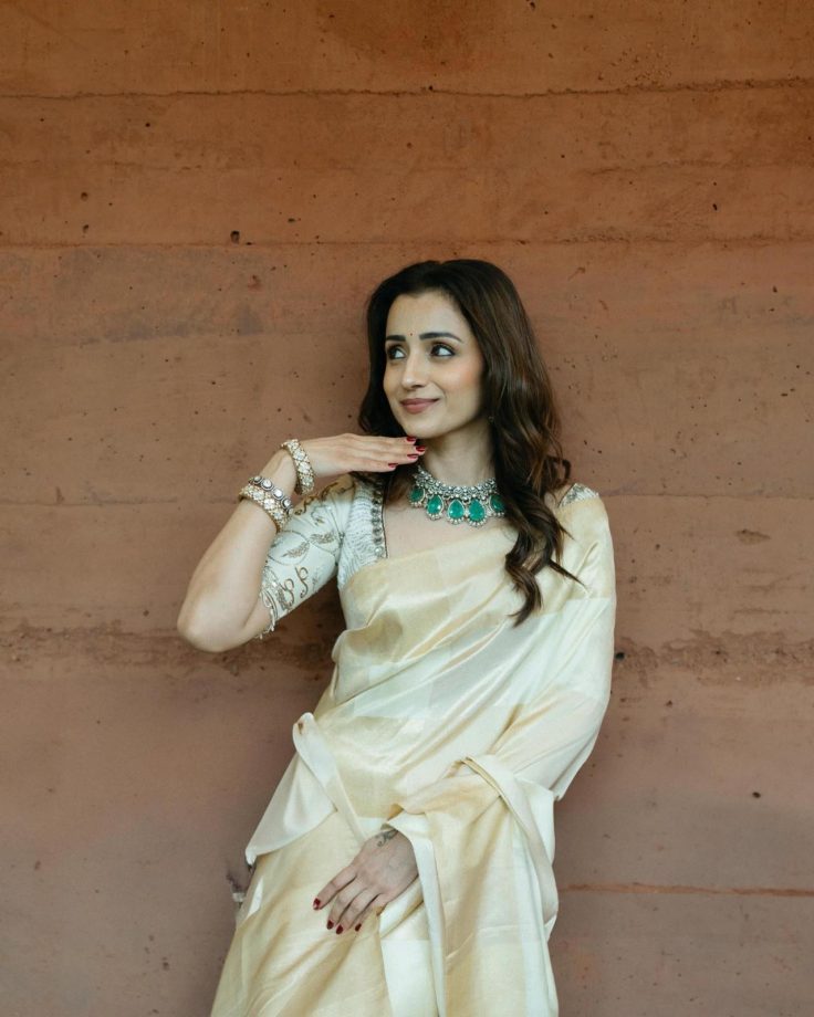 Trisha Krishnan's Fashion Game Is Unmatched in a Fiery Red Gown and Chic Off-White Saree 1