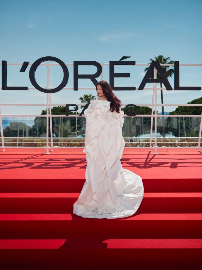 Aishwarya Rai Bachchan Hidden Cannes 2026 Fashion Moment, Custom Pearl-Detail Gown, Sculptural Cape Showstopper 1