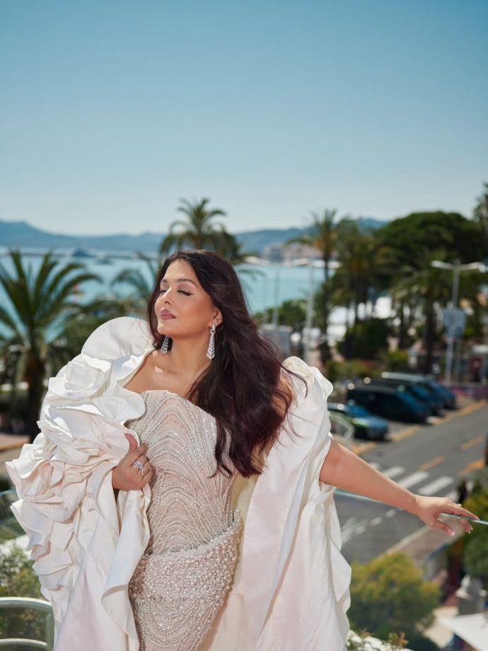 Aishwarya Rai Bachchan Hidden Cannes 2026 Fashion Moment, Custom Pearl-Detail Gown, Sculptural Cape Showstopper 1