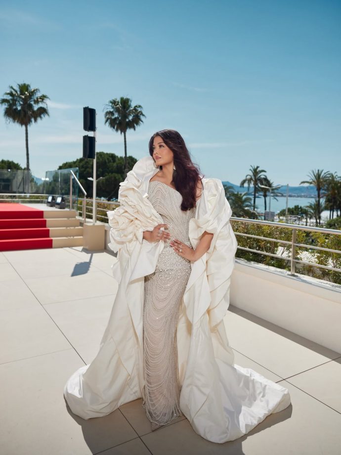 Aishwarya Rai Bachchan Hidden Cannes 2026 Fashion Moment, Custom Pearl-Detail Gown, Sculptural Cape Showstopper 1
