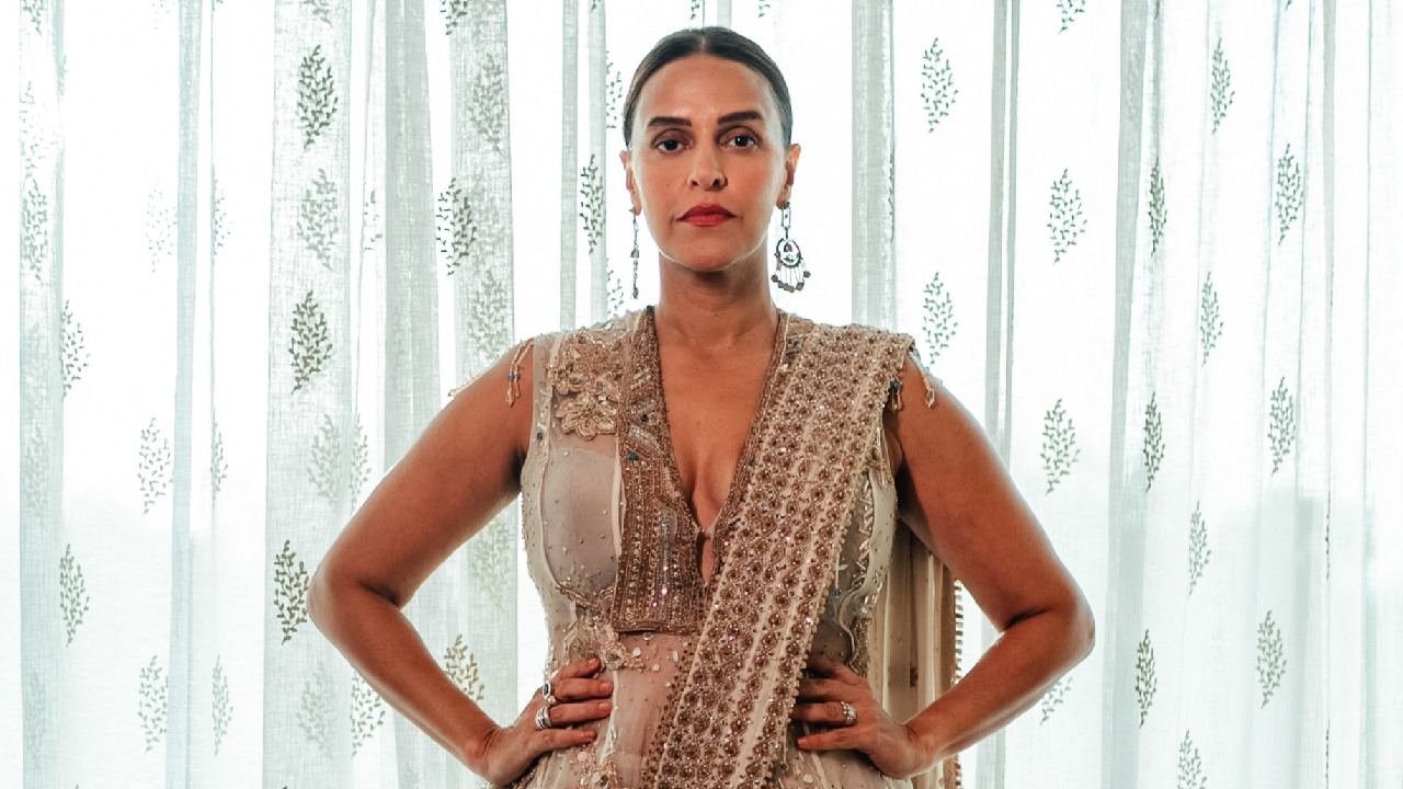 Neha Dhupia Elevates Ivory Saree Glamour With Statement Jacket 1