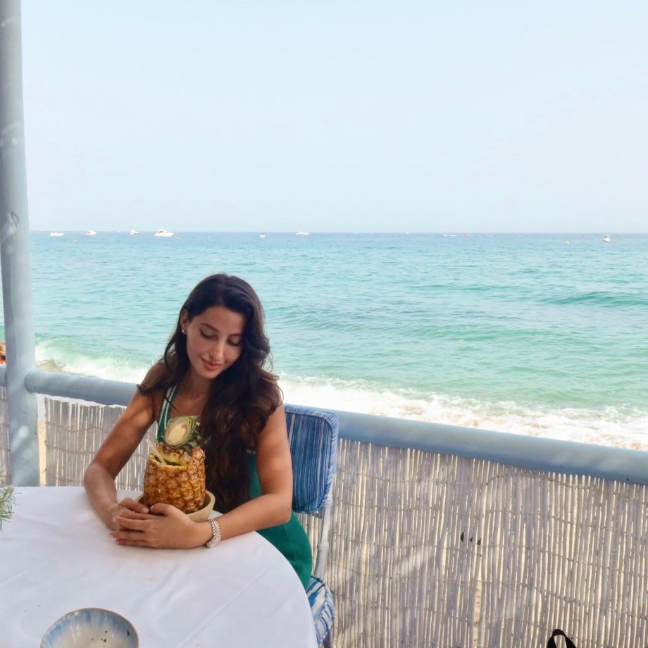 Nora Fatehi Slays In A Green Mini Dress During Her Spain Getaway 1