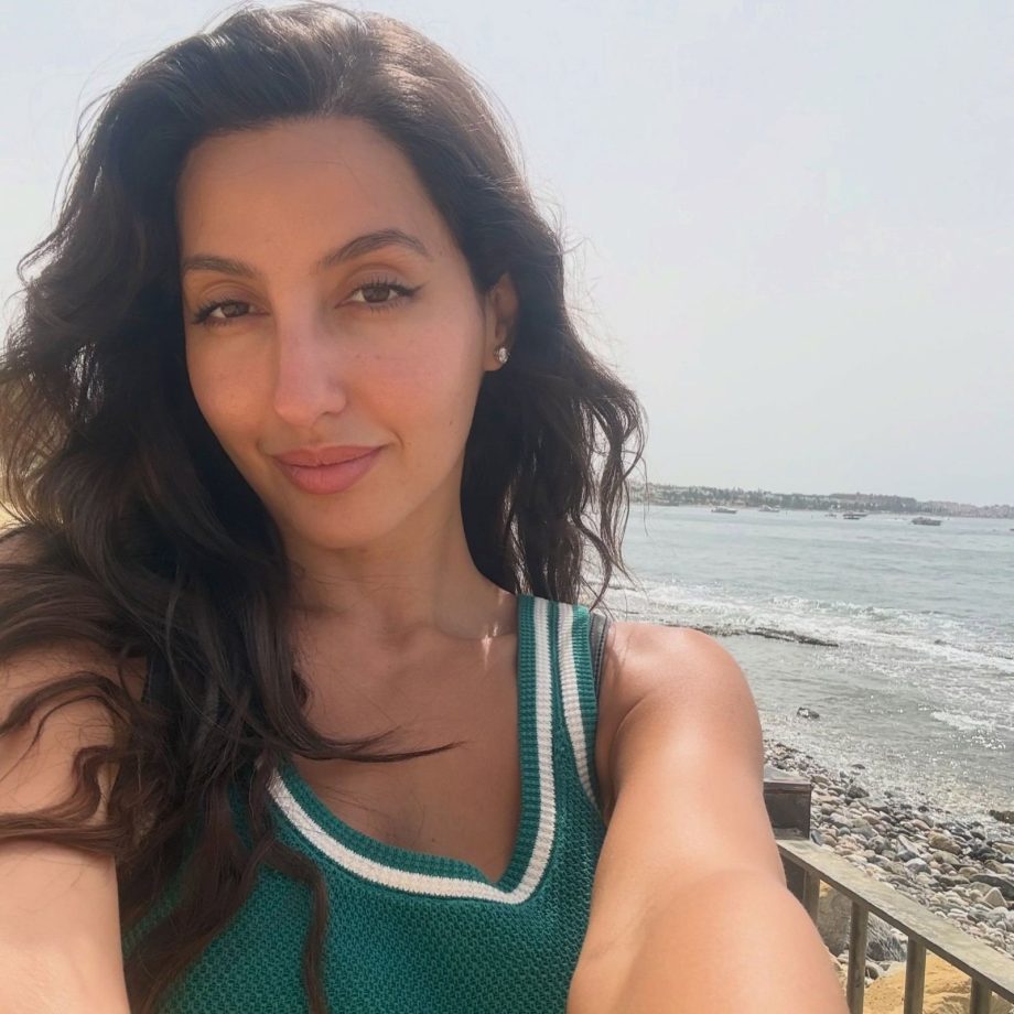 Nora Fatehi Slays In A Green Mini Dress During Her Spain Getaway 1