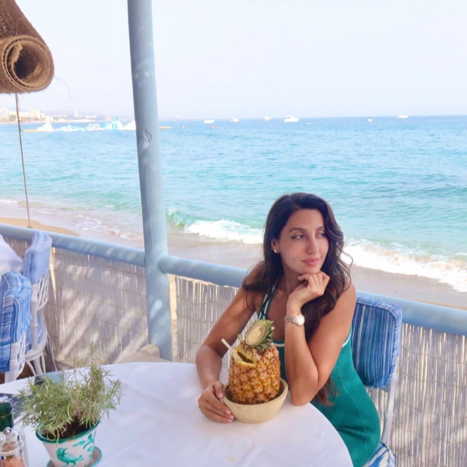 Nora Fatehi Slays In A Green Mini Dress During Her Spain Getaway 1