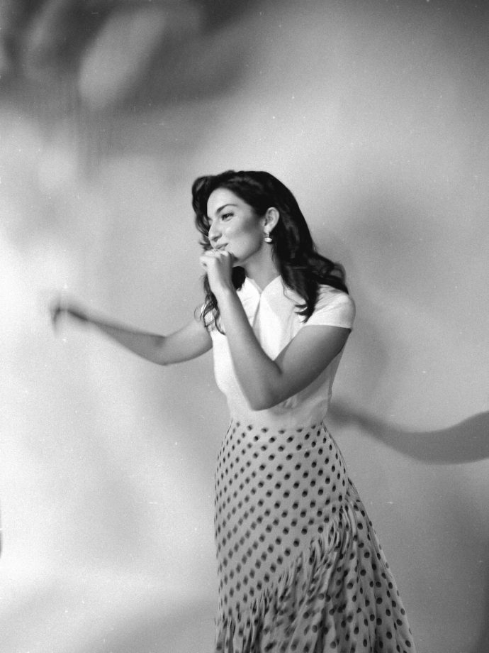 Pratibha Ranta Stunning Retro Polka-Dot Skirt, High-Collar White Top 1