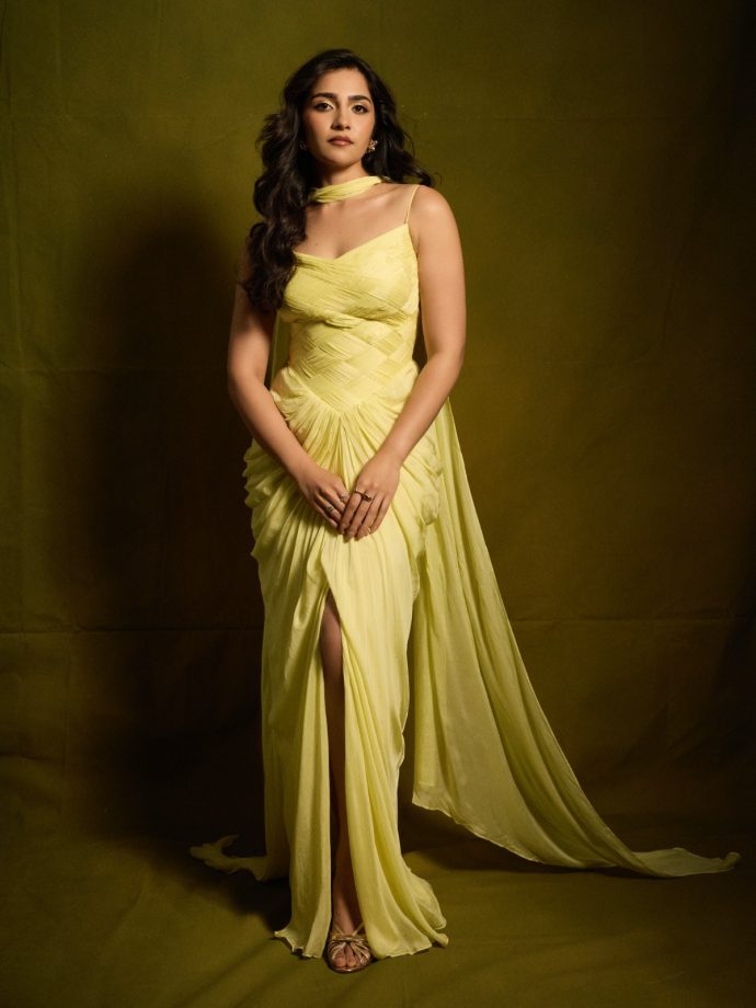 Rukmini Vasanth Exudes Regal Glamour In A Yellow Gown Draped, Flowing Silhouette 1