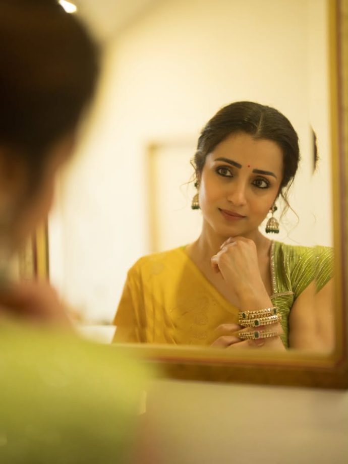 Trisha Krishnan Turns Heads in Sunshine Yellow Saree Emerald Green Blouse 1