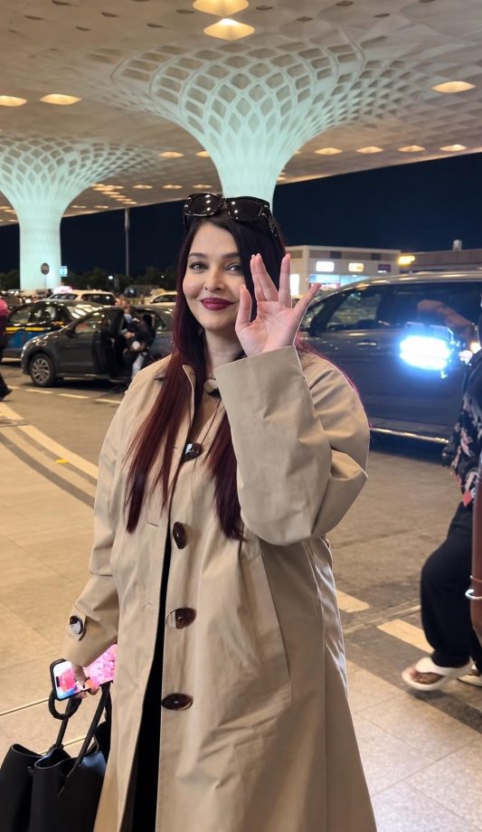 Aishwarya Rai Bachchan Elevates Her Airport Look in a Chic Cream Coat 1