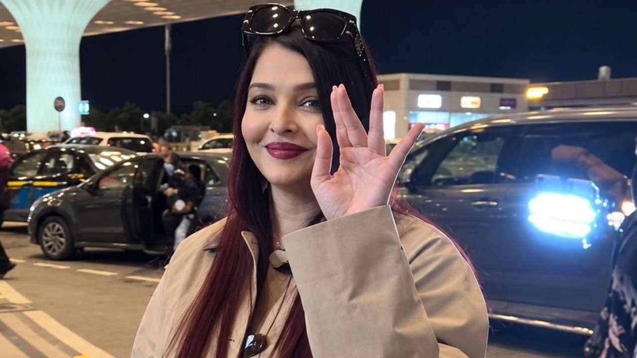 Aishwarya Rai Bachchan Elevates Her Airport Look in a Chic Cream Coat 1