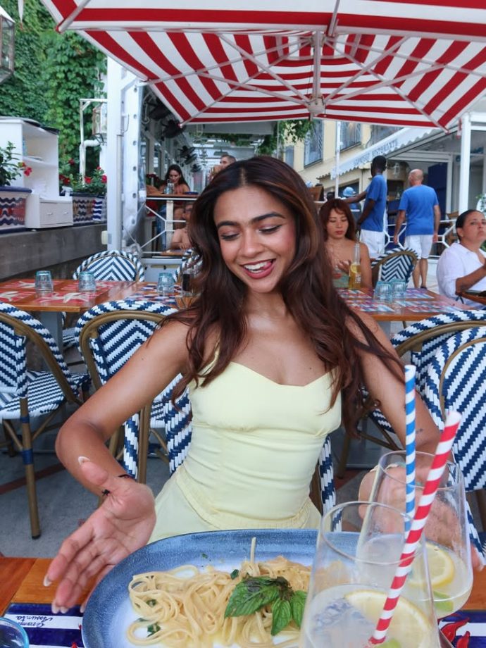 Apoorva Makhija aka Rebel Kid Shares Dreamy Italy Vacation Moments In Blue Bikini And Butter Yellow Look 1