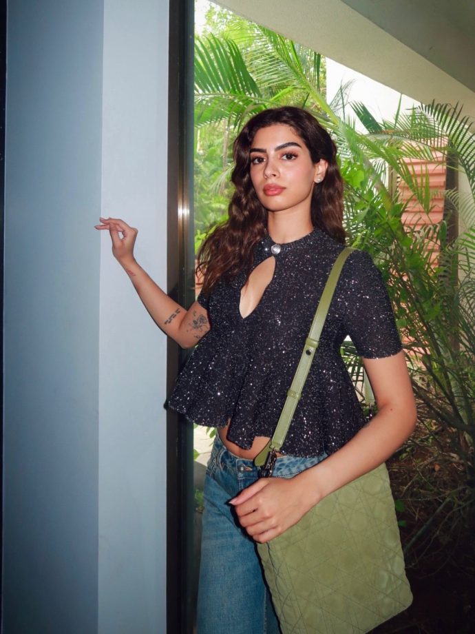 Khushi Kapoor Makes A Chic Statement In A Shimmery Black Crop Top And Blue Denim 1