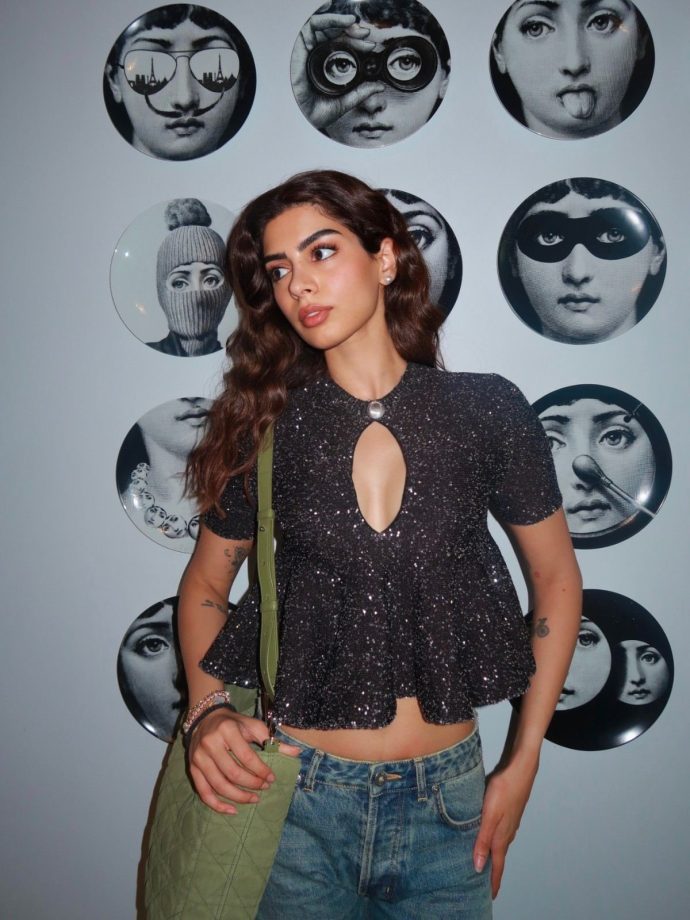 Khushi Kapoor Makes A Chic Statement In A Shimmery Black Crop Top And Blue Denim 1