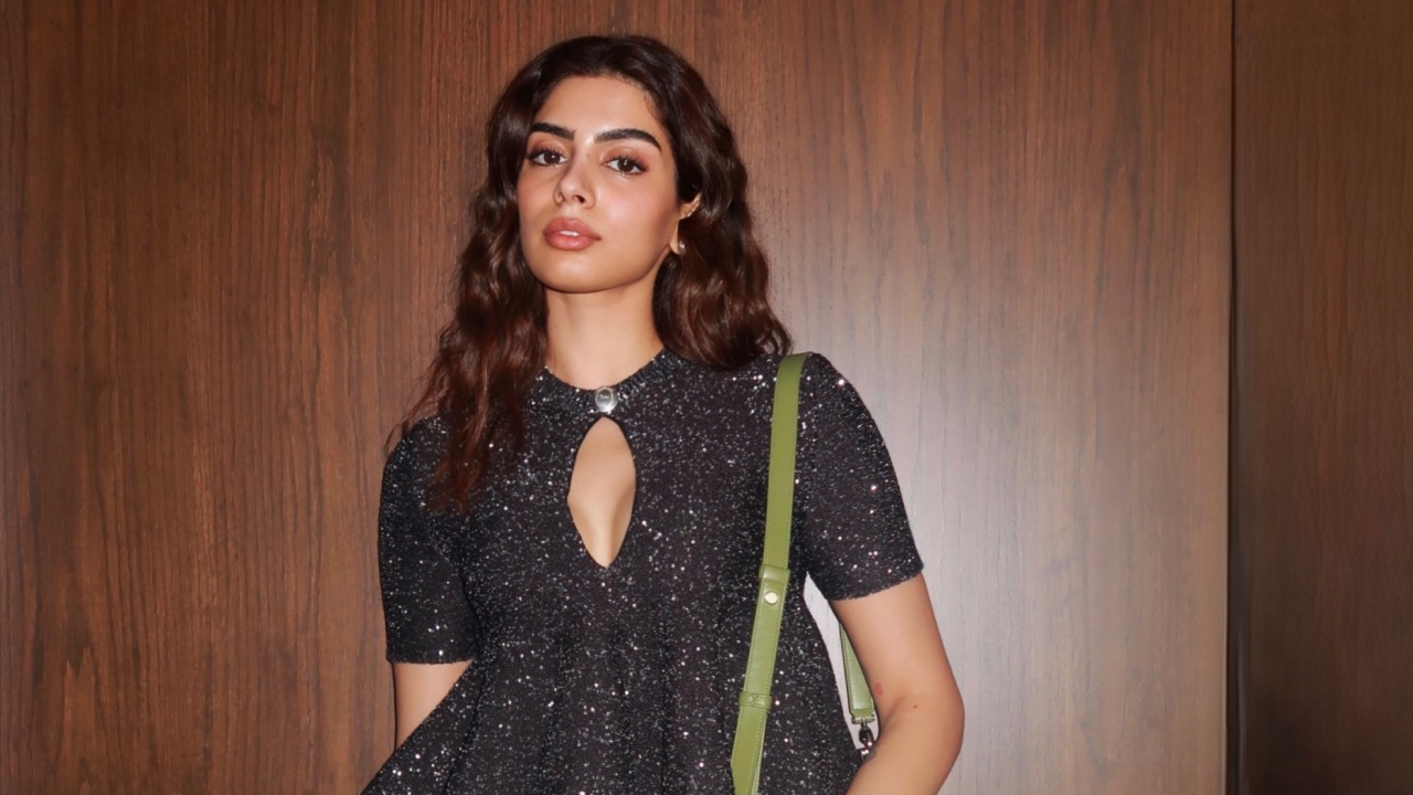Khushi Kapoor Makes A Chic Statement In A Shimmery Black Crop Top And Blue Denim 1