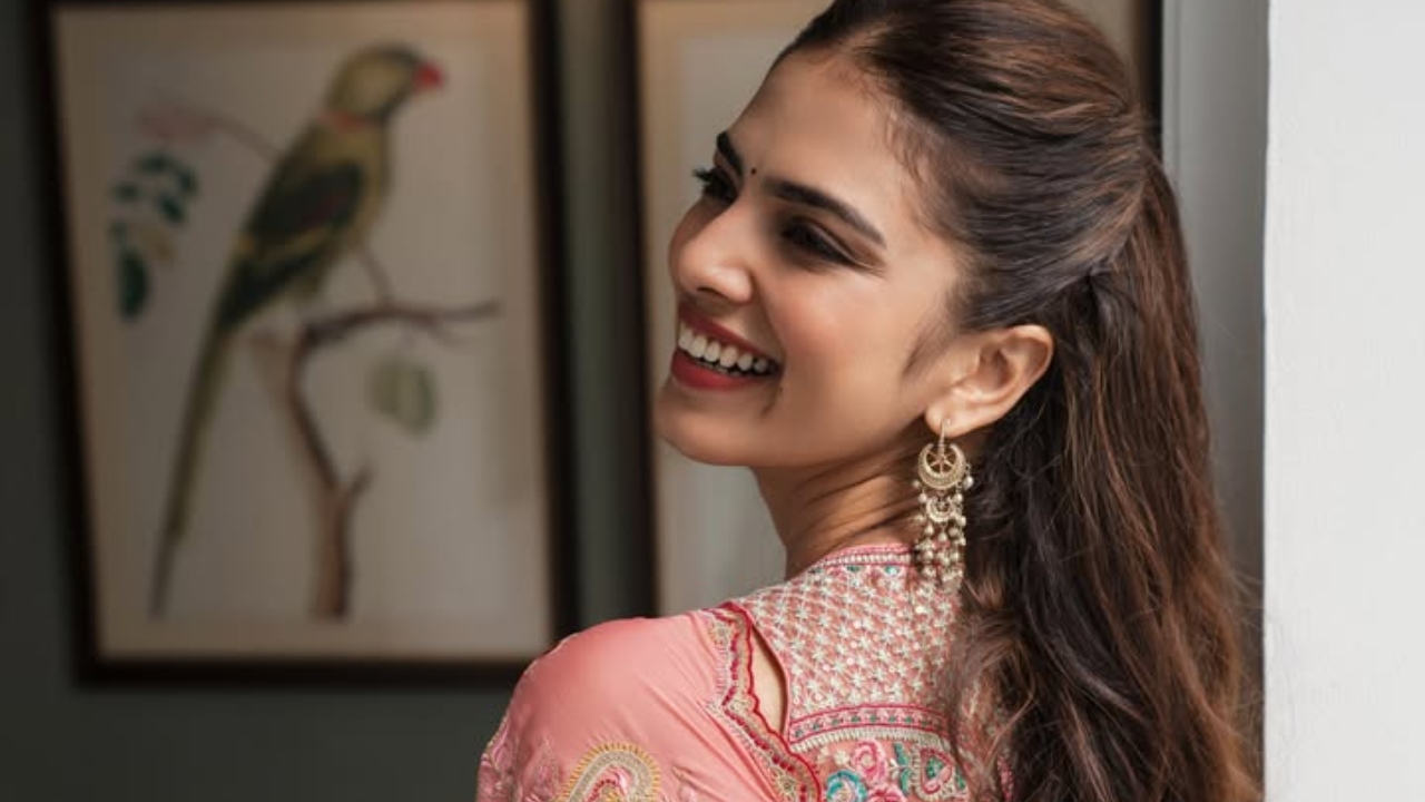 Malavika Mohanan’s Dreamy Peach Floral Saree & Halter-Neck Blouse 1