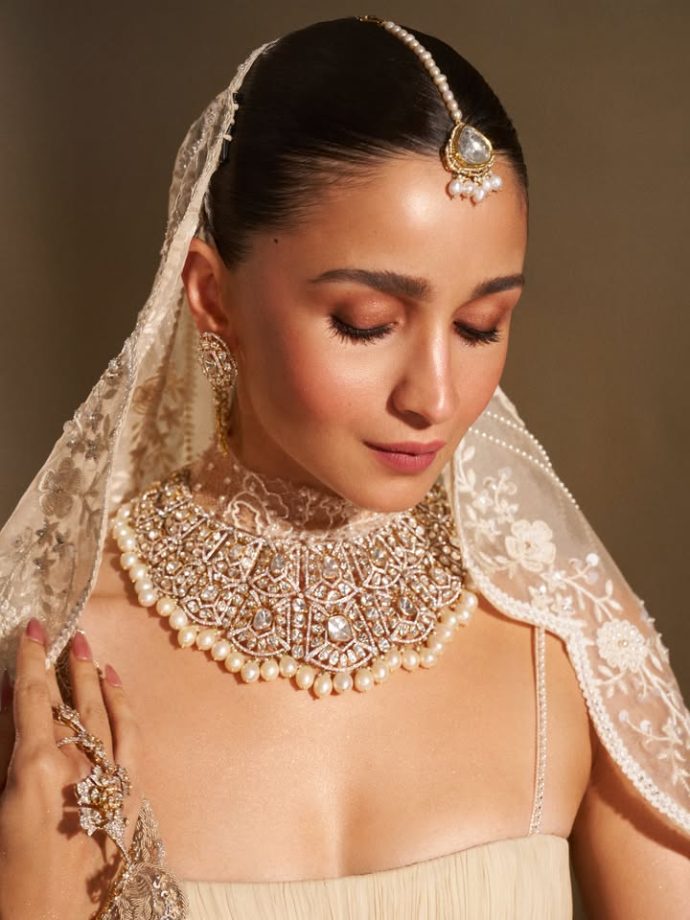 Alia Bhatt Captivates as Showstopper in a Handcrafted Ivory Saree With Regal Pearl Jewellery 1
