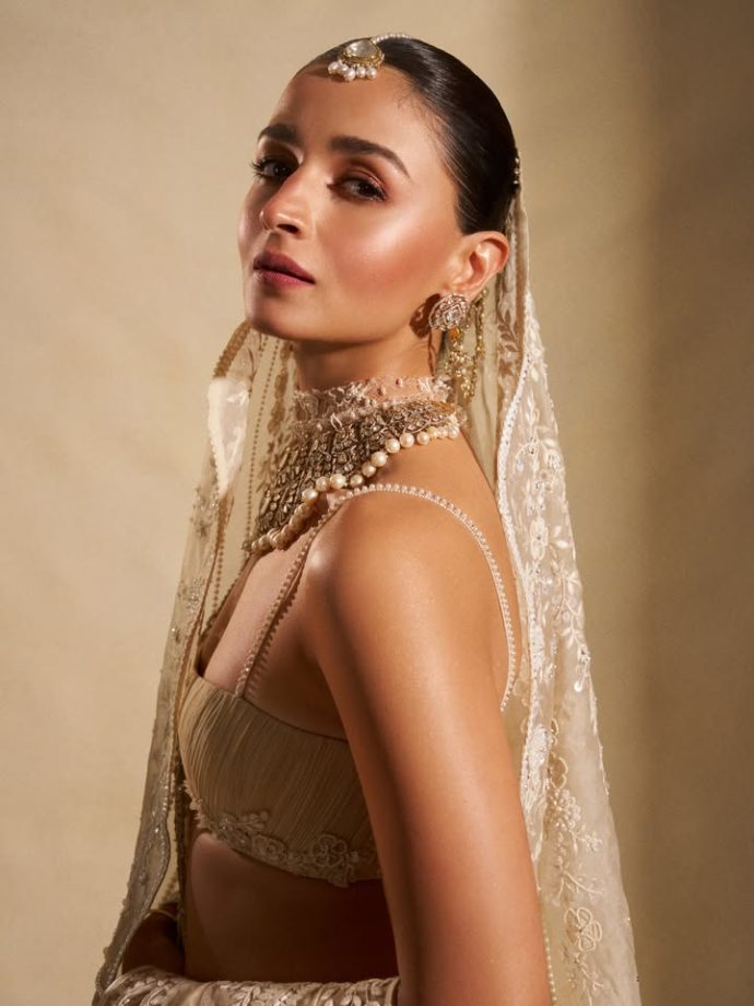 Alia Bhatt Captivates as Showstopper in a Handcrafted Ivory Saree With Regal Pearl Jewellery 1