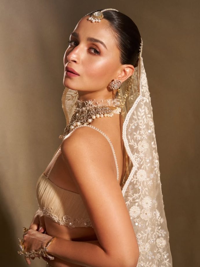 Alia Bhatt Captivates as Showstopper in a Handcrafted Ivory Saree With Regal Pearl Jewellery 1