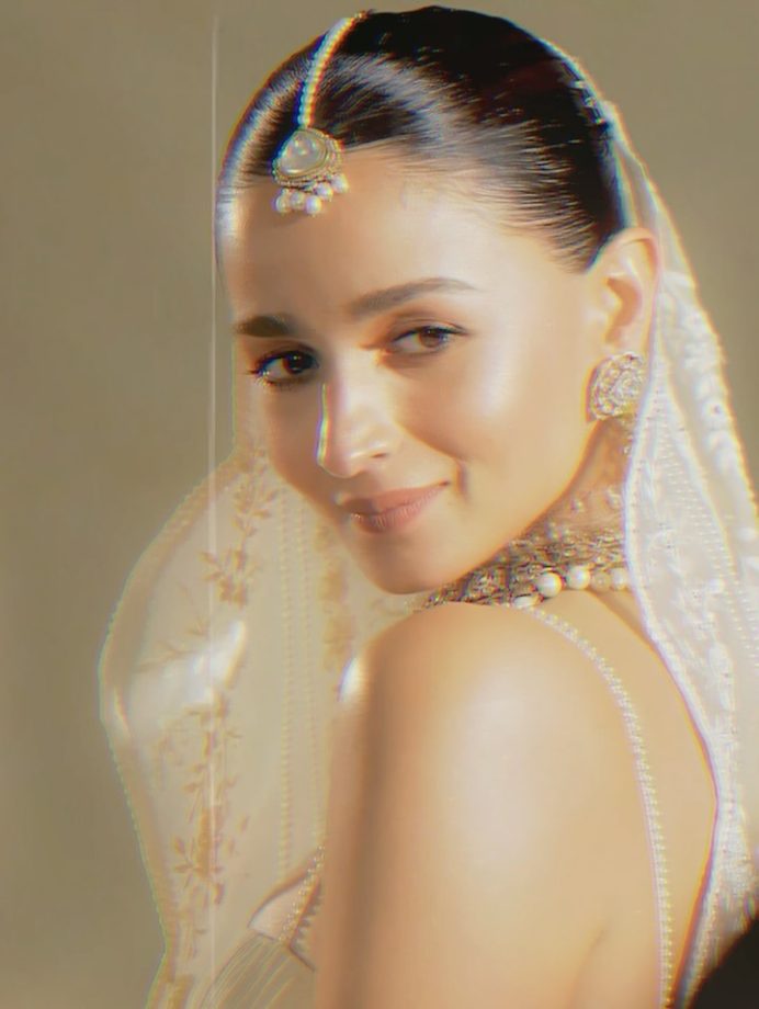 Alia Bhatt Captivates as Showstopper in a Handcrafted Ivory Saree With Regal Pearl Jewellery 1