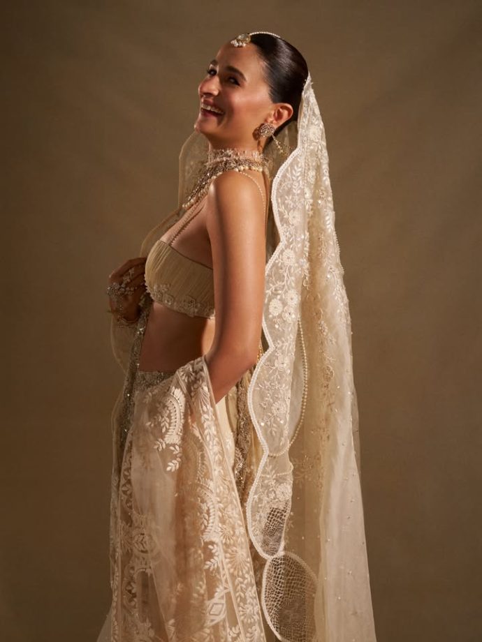Alia Bhatt Captivates as Showstopper in a Handcrafted Ivory Saree With Regal Pearl Jewellery 1