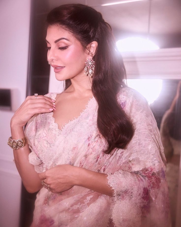 Jacqueline Fernandez Stuns In A Pink Floral Saree With Elegant Lace Detailing 1