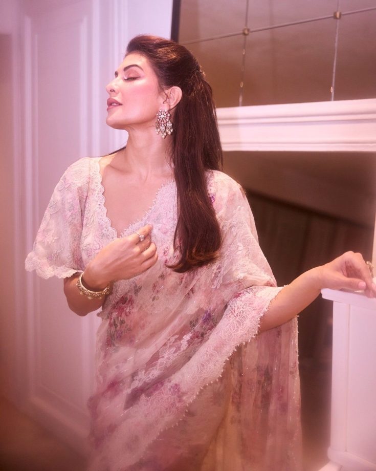 Jacqueline Fernandez Stuns In A Pink Floral Saree With Elegant Lace Detailing 1