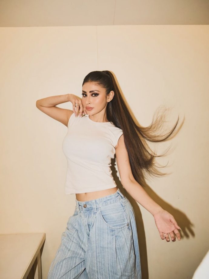 Mouni Roy’s Effortless Chic White Cropped Tank Top With High-Waisted Blue Denim 1