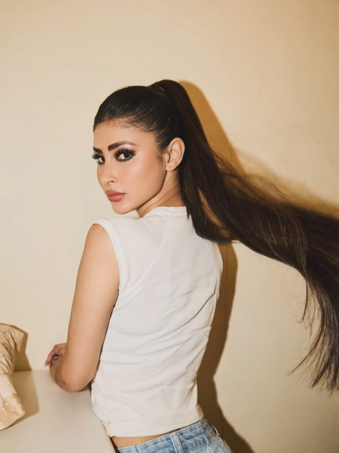 Mouni Roy’s Effortless Chic White Cropped Tank Top With High-Waisted Blue Denim 1