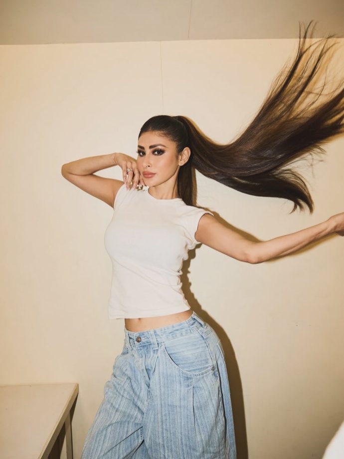Mouni Roy’s Effortless Chic White Cropped Tank Top With High-Waisted Blue Denim 1