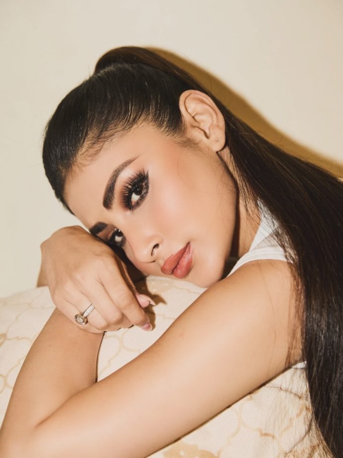 Mouni Roy’s Effortless Chic White Cropped Tank Top With High-Waisted Blue Denim 1