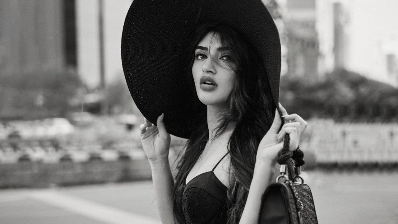 Sreeleela’s  Statement in a Black Dress and Dramatic Hat 1